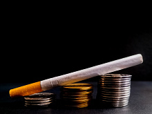Как стоимость сигарет влияет на распространенность курения?